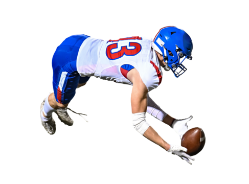 Young athletic football players making amazing plays during a competitive game