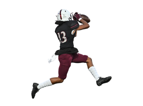 Young athletic football players making amazing plays during a competitive game