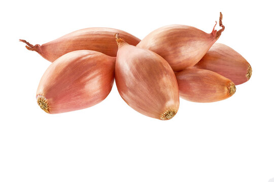 heap of shallots isolated on white background. shallot put together as a group isolated on white background.