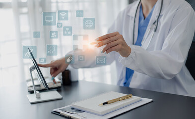 Medicine doctor touching on digital tablet and hologram modern virtual screen interface icons, Medical technology and futuristic concept.