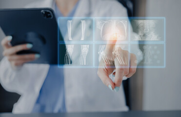 Medicine doctor touching on digital tablet and hologram modern virtual screen interface icons, Medical technology and futuristic concept.