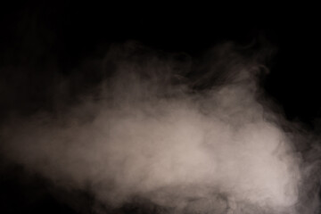 White steam on a black background.