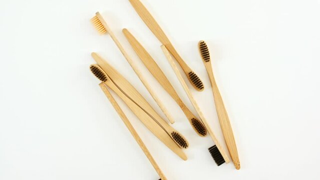 Eco-friendly biodegradable Bamboo toothbrush. No plastic. Conscious minimalism Vegan lifestyle. Reuse reduction concept. High quality 4k footage