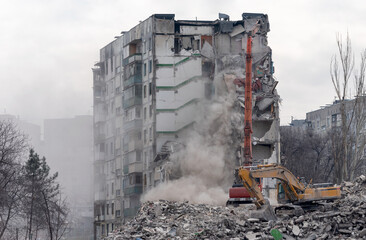 construction equipment destroys affected houses war in Ukraine