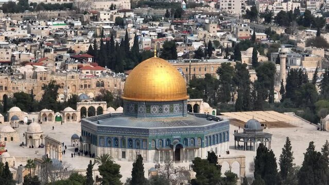 Al Aqsa golden dome of the rock, Jerusalem, Aerial view,

Drone view from the old city of Jerusalem, 4K, march, 2023 
