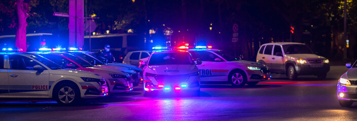 police cars in night city © Daniel