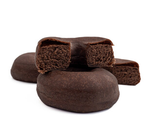 Dark vegetarian donut isolated on white background. Close-up.