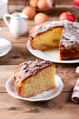 Fresh sponge cake with apples. Chiffon biscuit on table