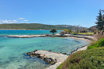 small cove with crystal clear water on Dodo Beach in Ardic (Cesme, Izmir region, Turkey)