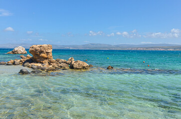 small cove with crystal clear water on Dodo Beach in Ardic (Cesme, Izmir region, Turkey) © ssmalomuzh