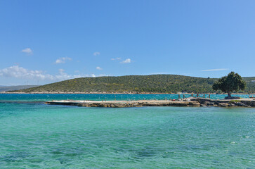 small cove with crystal clear water on Dodo Beach in Ardic (Cesme, Izmir region, Turkey)