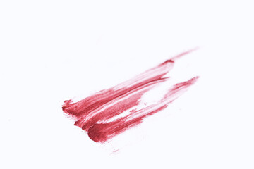 Lipstick smudged on white with clipping path.