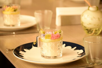 floral candles in crystal glasses
