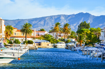 Fototapeta na wymiar Summer panorama of Empuriabrava with yachts, boats and waterways in Costa Brava, Catalonia, Spain