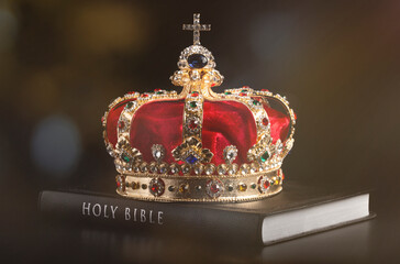 A Gold Crown with Red Velevet on a Bible