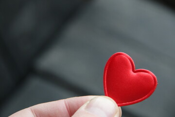 Fototapeta premium Red heart on a vintage background. Place for text. Birthday background.