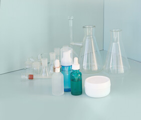skin serum, moisturizing and whitening serum, fruit acids.Glass Volumetric Flask  ,Laboratory Flasksare used for  laboratory work  in the background