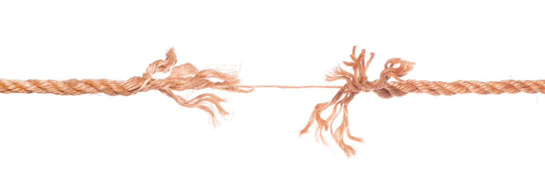 Long frayed rope near to break. Isolated png with transparency