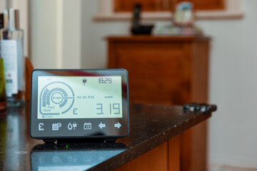 Smart energy meter in a home interior to monitor electricity usage in the house and reduce cost of...