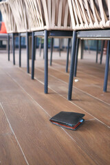  left wallet on floor at home 