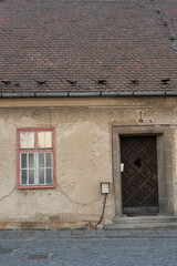 old European style house, checkered road