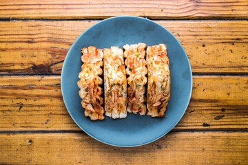 Cheesy Grilled Sandwich isolated on wooden board top view on table fastfood