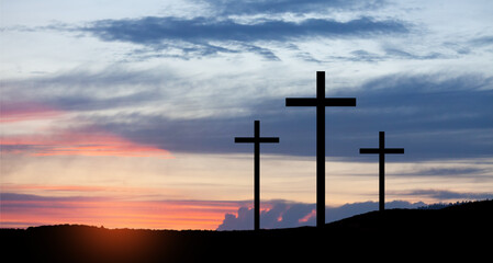 Obraz premium Christian crosses on hill outdoors at sunrise. Resurrection of Jesus. Concept photo.