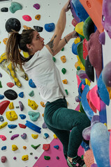 Fototapeta premium Climbing arround the wall having fun