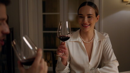 Smiling family testing alcohol romantic dinner closeup. Pair enjoying evening