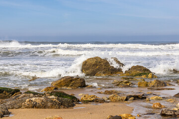 Europe, Portugal. Alcozelo. Breaking waves at the Praia da Mriamar, Miramar Beach.