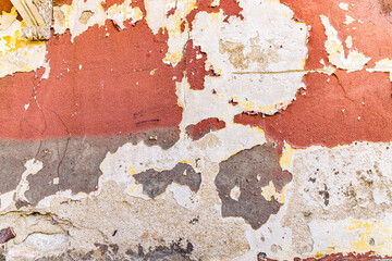 Peeling paint an stuccon on a building in Caminha.