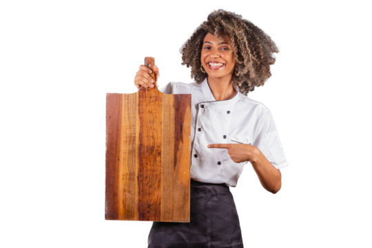 Young black Brazilian woman, cook, masterchef, wearing restaurant uniform. holding wooden board for texts and advertisements, presenting.