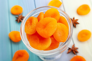 dried apricot on wood background