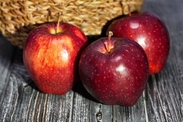 red apples on wood background