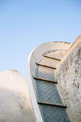 Futuristic white concrete building, flowing building. Kyiv crematorium.