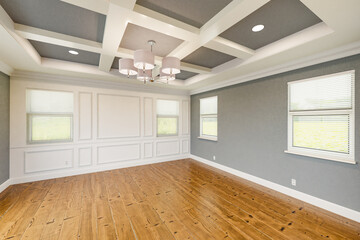 Beautiful Gray Custom Master Bedroom Complete with Entire Wainscoting Wall, Fresh Paint, Crown and Base Molding, Hard Wood Floors and Coffered Ceiling - obrazy, fototapety, plakaty