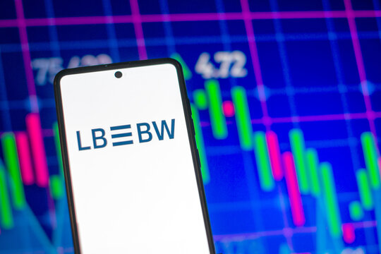 Galati, Romania - March 28, 2023: Smartphone with Landesbank Baden-Württemberg  logo. Landesbank Baden-Württemberg stock chart on the background