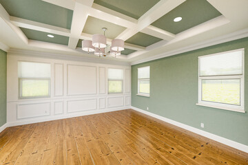 Beautiful Light Green Custom Master Bedroom Complete with Entire Wainscoting Wall, Fresh Paint, Crown and Base Molding, Hard Wood Floors and Coffered Ceiling - obrazy, fototapety, plakaty