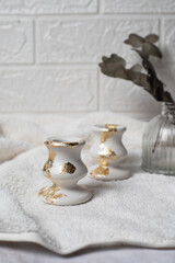 Decorative plaster candle holder with potal