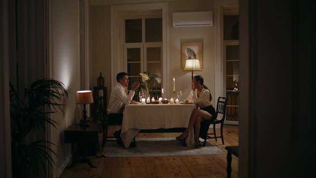 Loving Couple Romantic Evening At Home. Lovers Enjoying Dinner With Candles