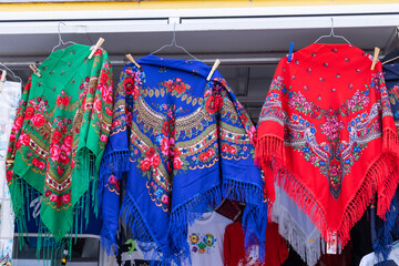 Colorful shawls for sale in the beach town of Nazare.