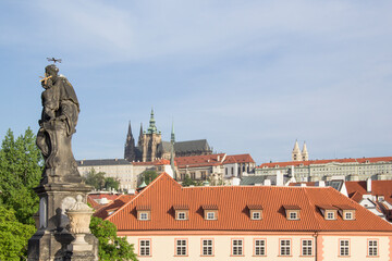 Fototapeta premium Beautiful view of Old Town Tower of Charles Bridge at dawn in Prague, Czech Republic