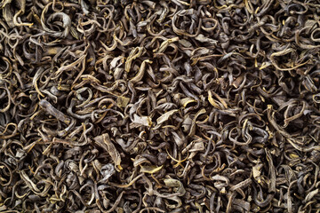 Background of chinese green tea, close up. Green Tea use for weight loss, caffeine alternative and improving heart health. Macro