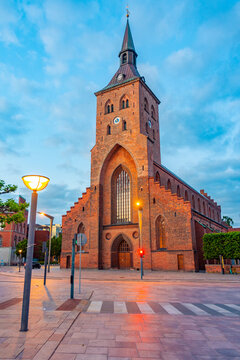 Sunset view of St. Canute's Cathedral in Danish town Odense