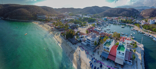 drone photo of huatulco oaxaca mexico panoramic summer scenic view vacation spot pacific coast america in the sunset 