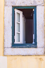 An open window on a building in Lisbon.