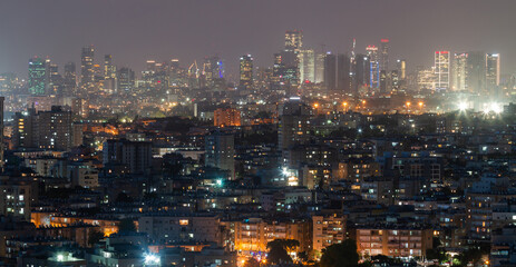 Tel Aviv city, Israel night panorama. Modern view of Gush Dan and suburbs. Jaffa, Ramat Gan and Bat Yam streets
