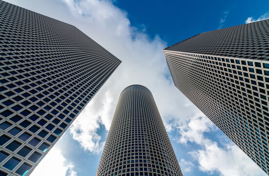 Tel Aviv city: azrieli towers and blue sky, bottom-up view
