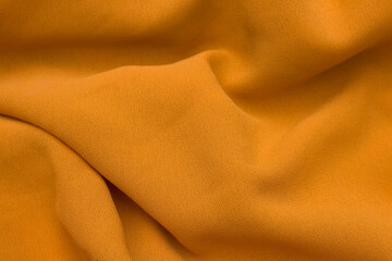 background of wavy yellow cloth