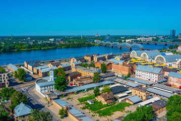 Aerial view of Riga including the Latvian national library and the zeppelin hangars from top of the academy of sciences building. © dudlajzov